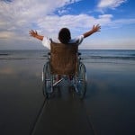 Boy in Wheelchair on a Beach